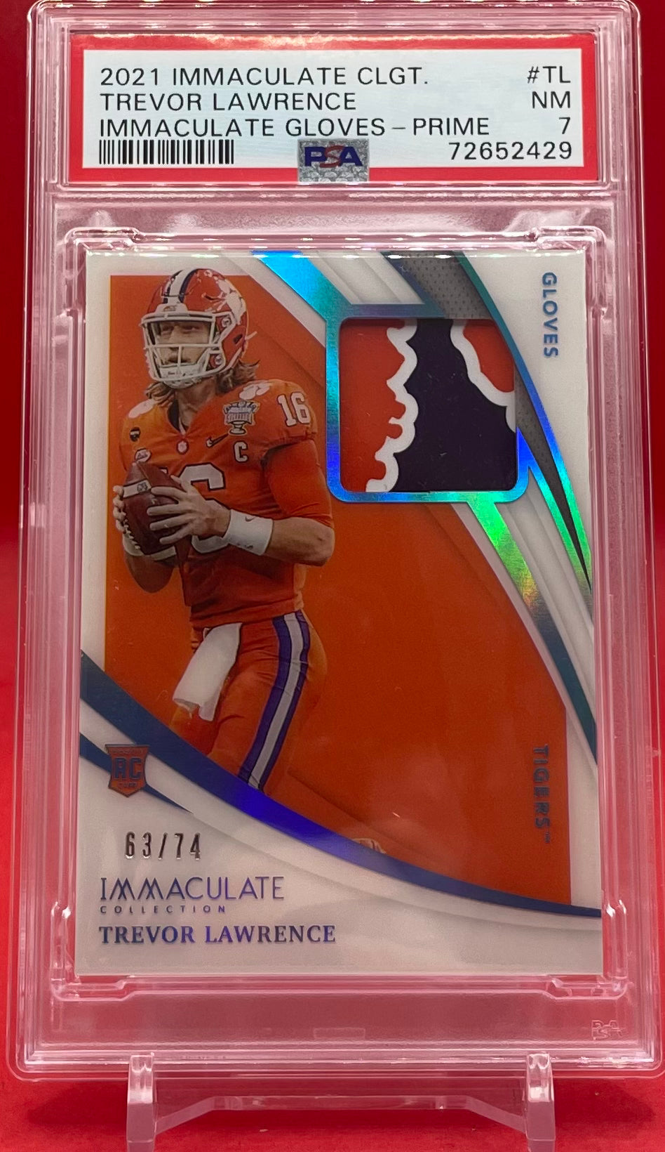 2021 TREVOR LAWRENCE IMMACULATE CLGT IMMACULATE GLOVES- PRIME POP. 1 2 HIGHER- PSA 7 NM